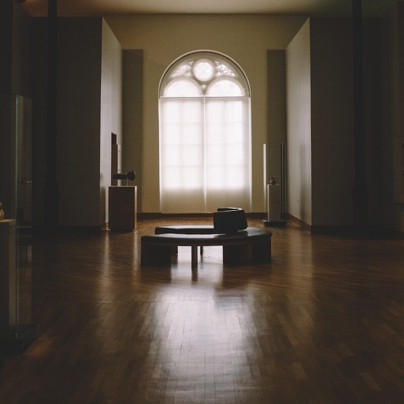 black wooden table near window