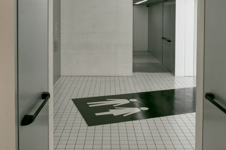 Where you should not use laminate flooring?